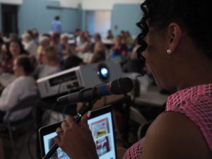 Speaker view of guild meeting Kimberly Bennefield leads a meeting of the Portland Modern Quilt Guild as President