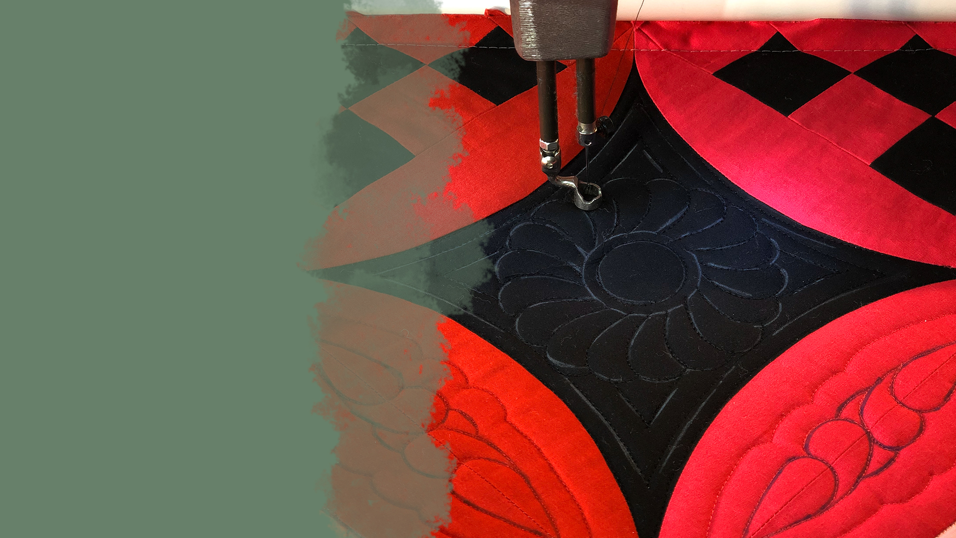 Longarm sewing machine quilting a feathered wreath pattern